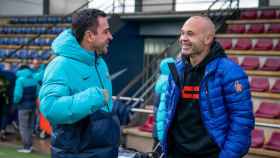 Iniesta visita a Xavi durante un entrenamiento del Barça / FCB