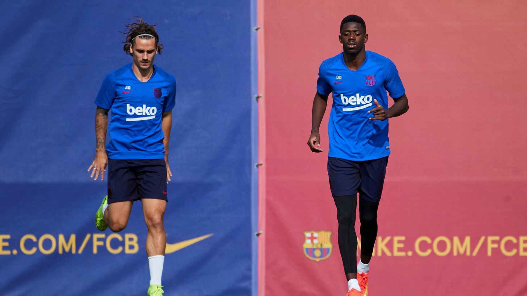 Una foto de Antoine Griezmann y Ousmane Dembelé durante un entrenamiento del Barça / EFE