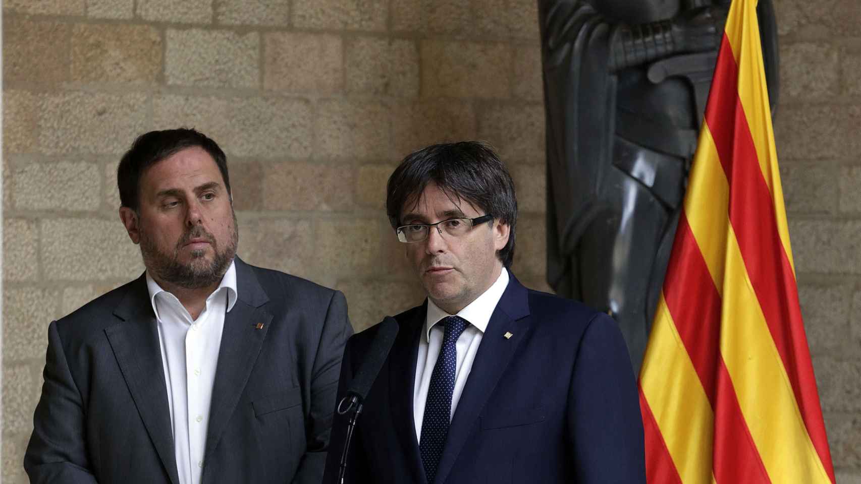 El vicepresidente catalán, Oriol Junqueras, y el presidente, Carls Puigdemont | EFE