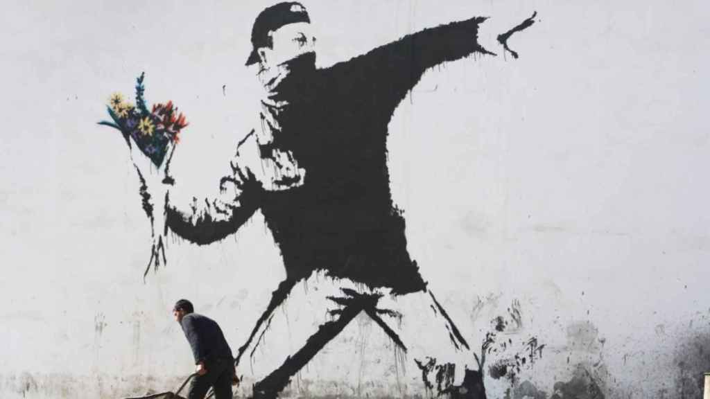 Una de las obras más emblemáticos del grafitero de Bristol, Bansky / ART OF PROTEST GALLERY