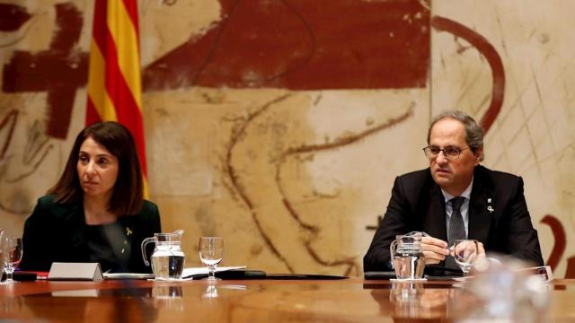 Meritxell Budó, junto al presidente de la Generalitat, Quim Torra / EFE