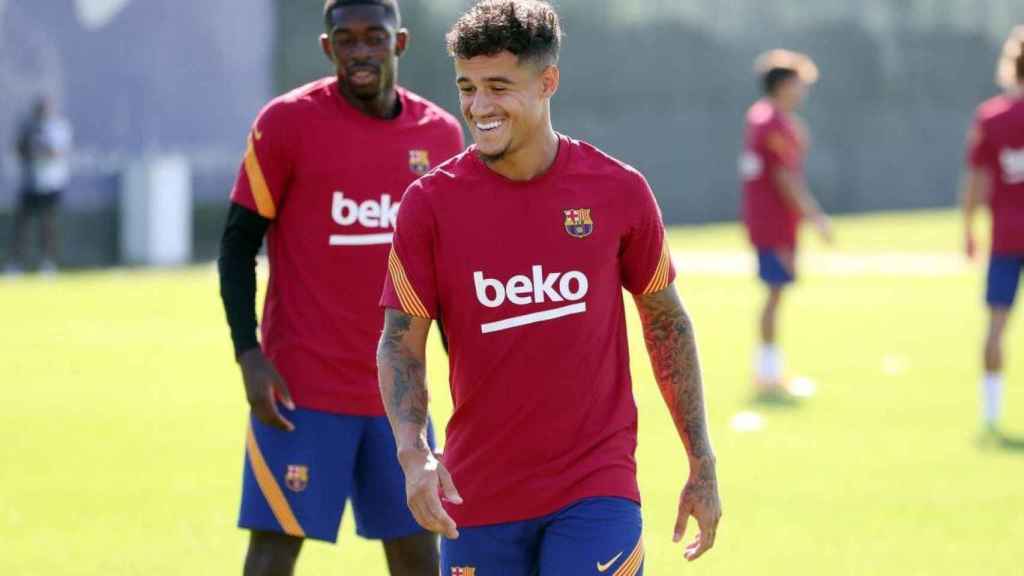 Philippe Coutinho y Dembelé, durante un entrenamiento con el Barça, la temporada pasada / EFE