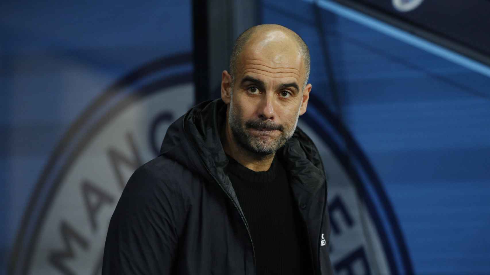 Guardiola en una imagen de archivo con el City / EFE