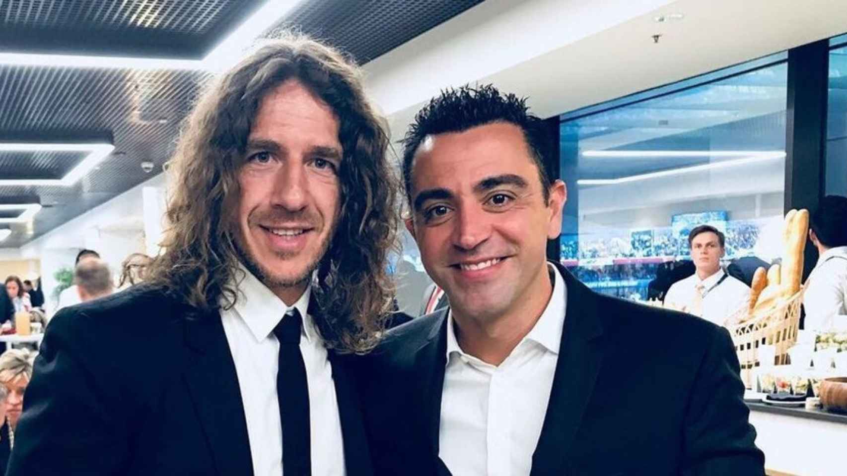 Xavi Hernández y Carles Puyol coinciden en un evento   EFE