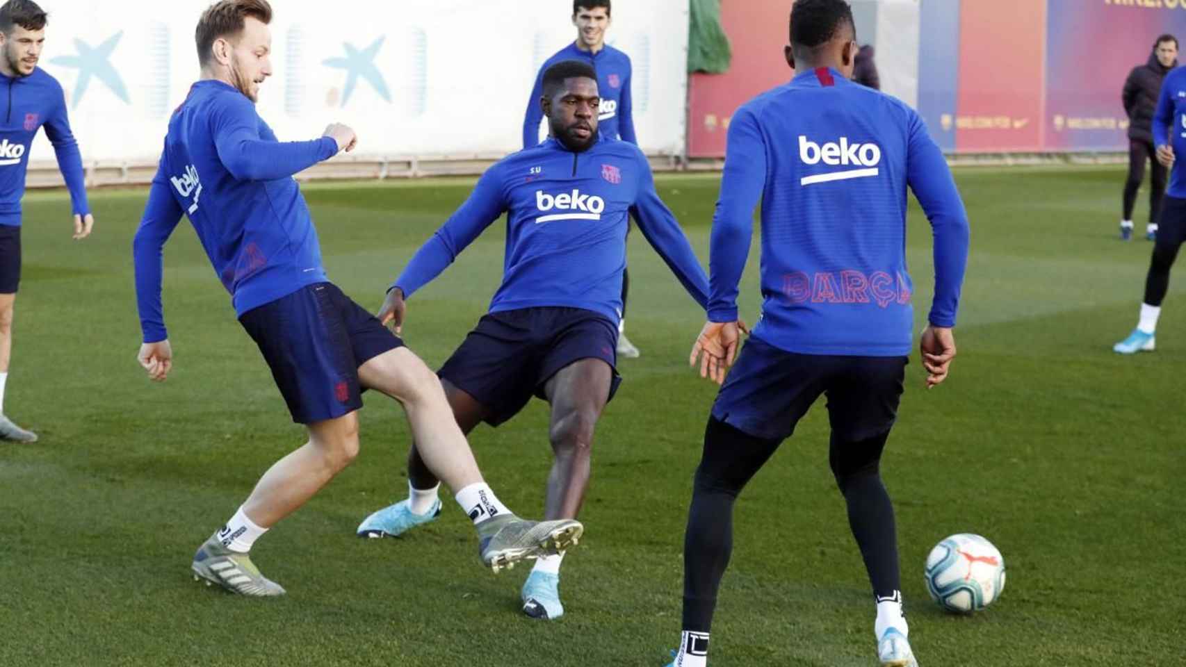 Ivan Rakitic y Samuel Umtiti en un entrenamiento del Barça / FC Barcelona