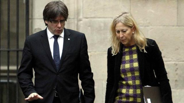 El presidente de la Generalitat, Carles Puigdemont, y la portavoz del Gobierno catalán, Neus Munté, en una imagen de archivo / EFE