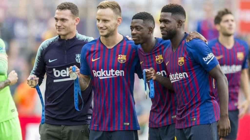 Rakitic y Dembelé en un partido con el Barça / EFE