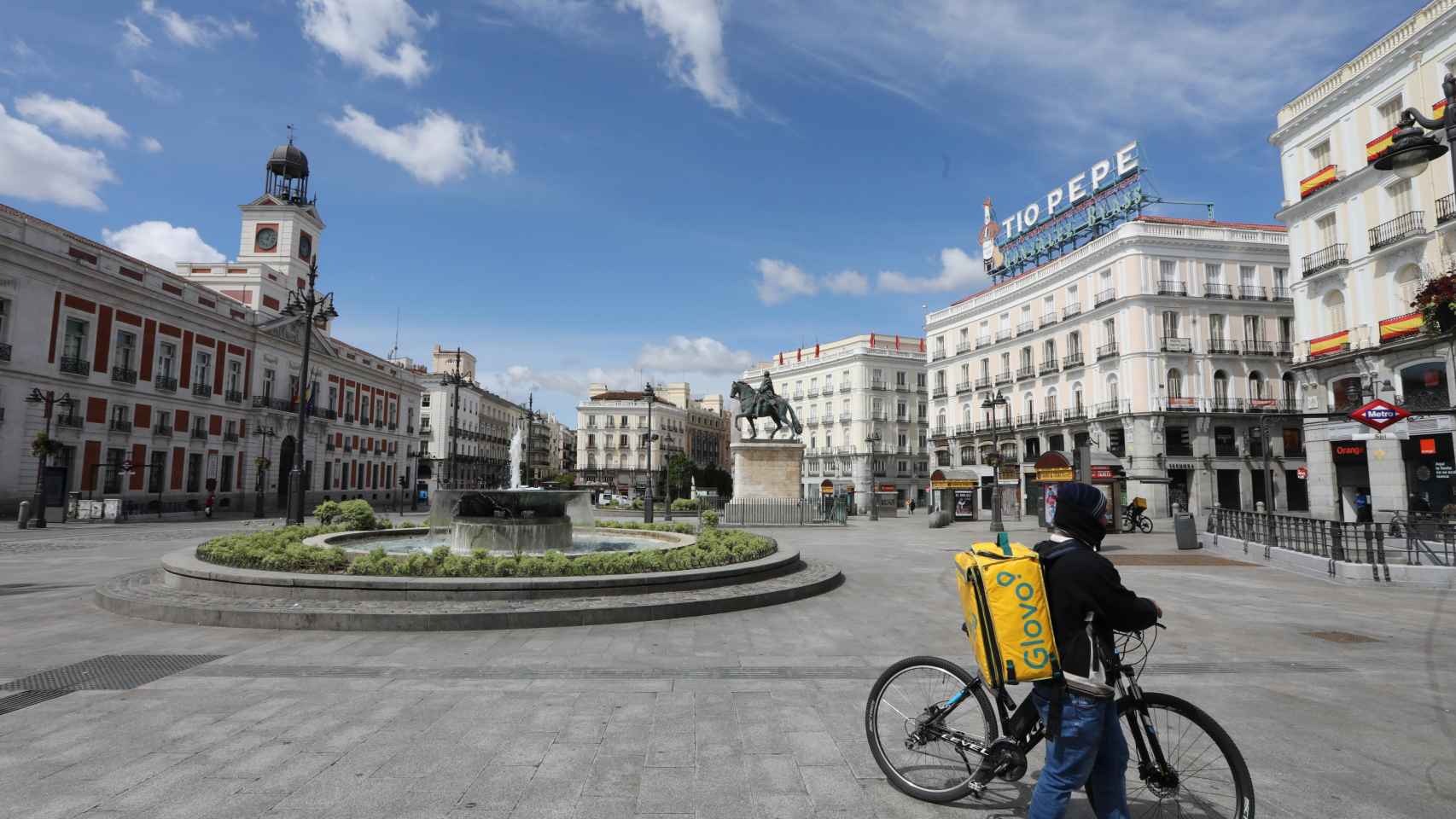 Un repartidor de Glovo en Sol durante el estado de alarma / EP