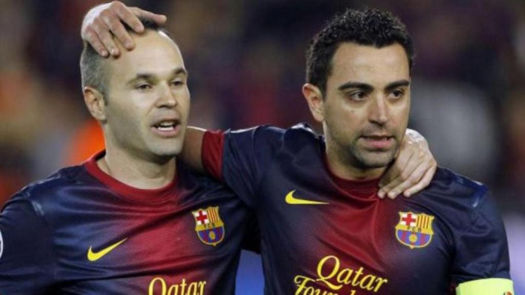 Andrés Iniesta, junto a Xavi Hernández / EFE