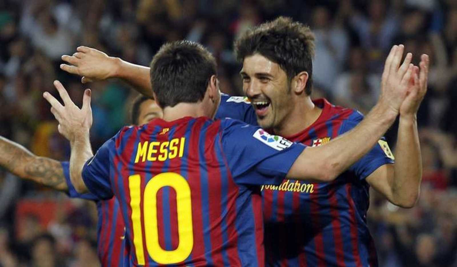 David Villa y Leo Messi celebran un gol del Barça / EFE