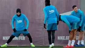 Leo Messi y Lenglet durante un entrenamiento del Barça / EFE