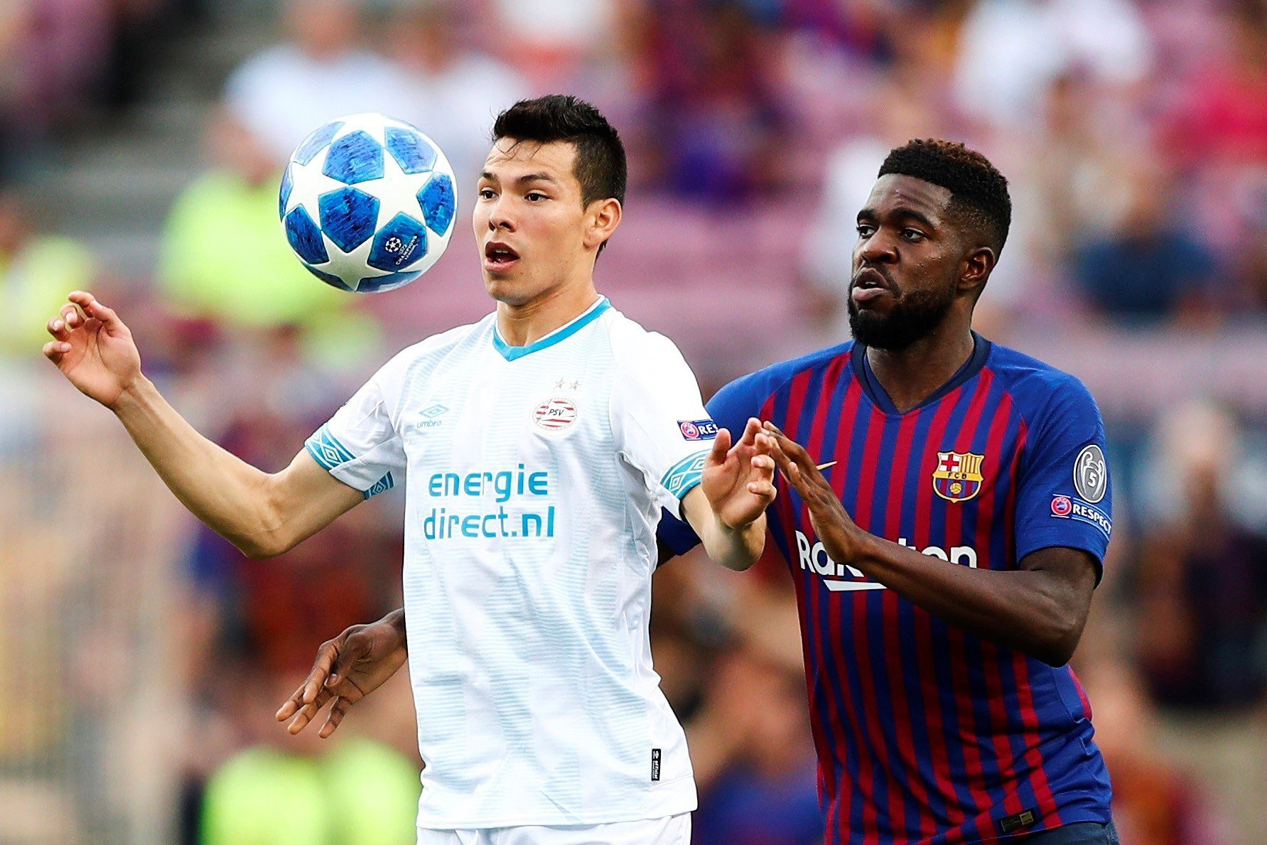 Una foto de Hirvin Lozano con Umtiti en el Barça - PSV / EFE