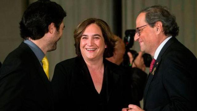 Los políticos Quim Torra, Ada Colau y Jordi Puigneró en la cena de gala del MWC / EFE