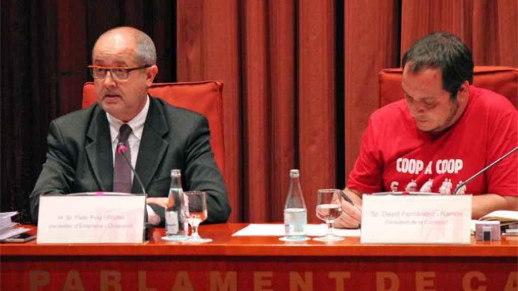 El consejero de Empresa y Empleo, Felip Puig, en su comparecencia en la 'comisión Pujol', al lado del presidente de la misma, el diputado de la CUP David Fernández