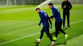 Leo Messi y Luis Suárez en un entrenamiento del Barça / EFE