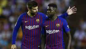 Umtiti y Piqué, durante un partidodel Barça / FCB