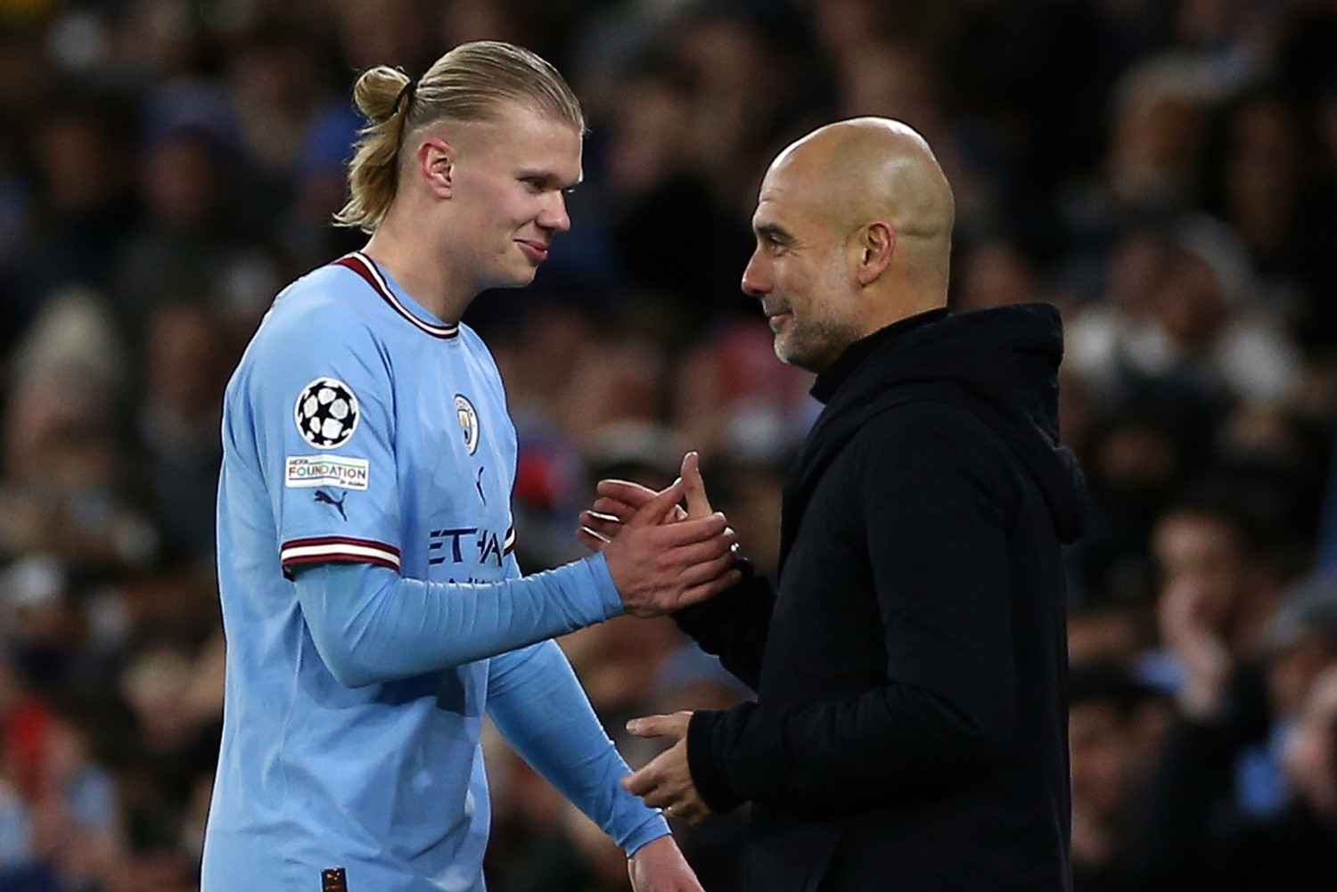 Erling Haaland y Pep Guardiola, tras el Manchester City-Leipzig / EFE