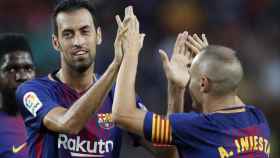 Sergio Busquets y Andrés Iniesta, celebrando un gol con el Barça / REDES