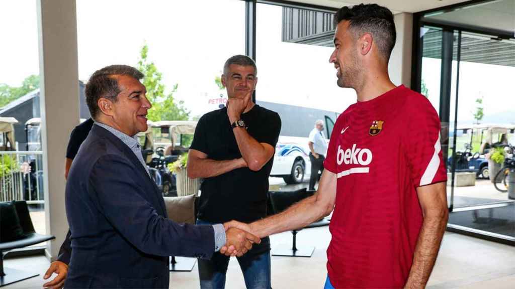 Busquets, Laporta y Enric Masip, en una imagen de archivo / FCB