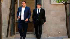 El presidente de la Generalitat, Carles Puigdemont, y su vicepresidente, Oriol Junqueras / EFE