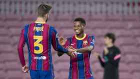 Piqué y Ansu Fati, celebrando un gol | EFE