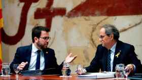 El vicepresidente de la Generalitat, Pere Aragonès (i), y el presidente catalán, Quim Torra (d) / EFE