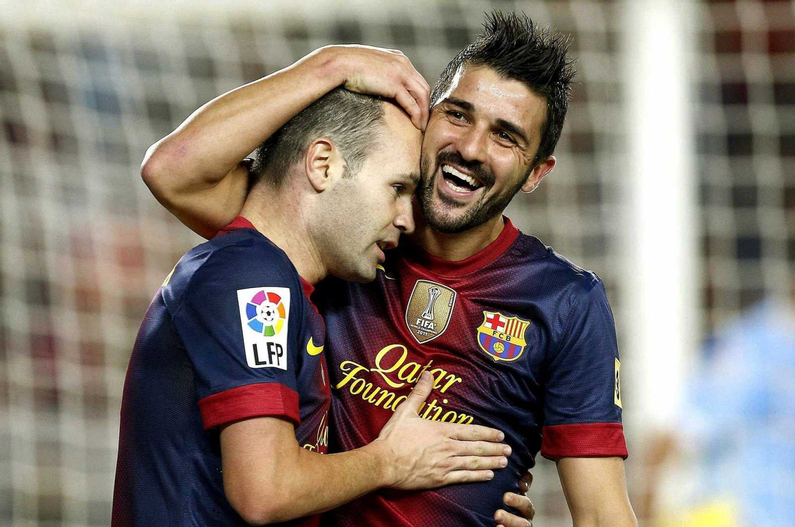 David Villa celebra un gol con Andrés Iniesta / EFE