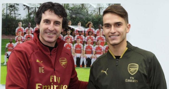 Denis Suárez con Unai Emery en la presentación del gallego / EFE