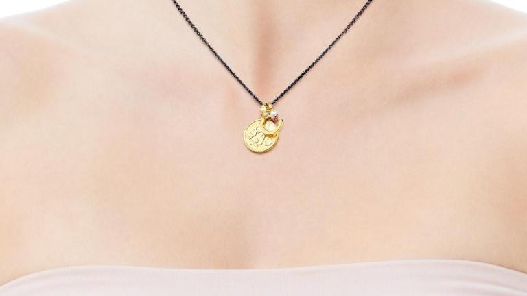 Un colgante de oro / TOUS
