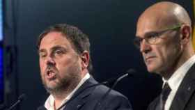 Oriol Junqueras y Raül Romeva en un acto de 2017 / EFE