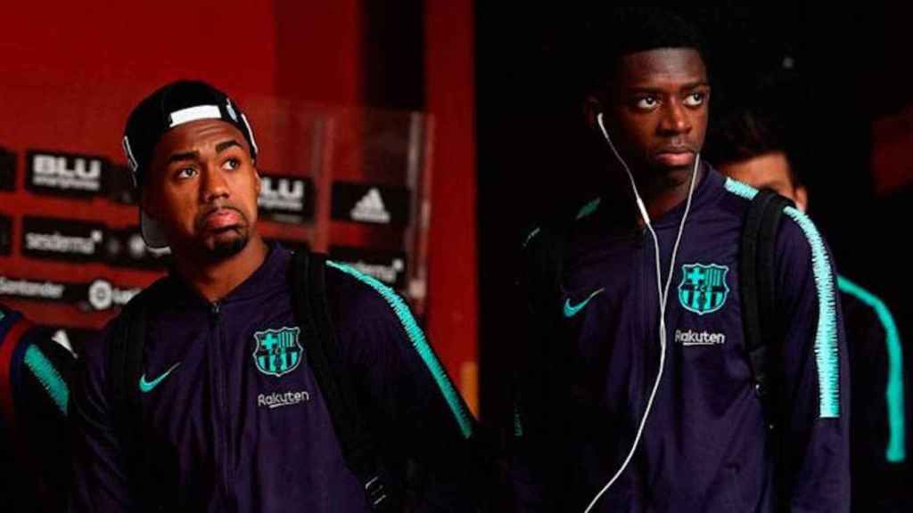 Una foto de archivo de Dembelé y Malcom