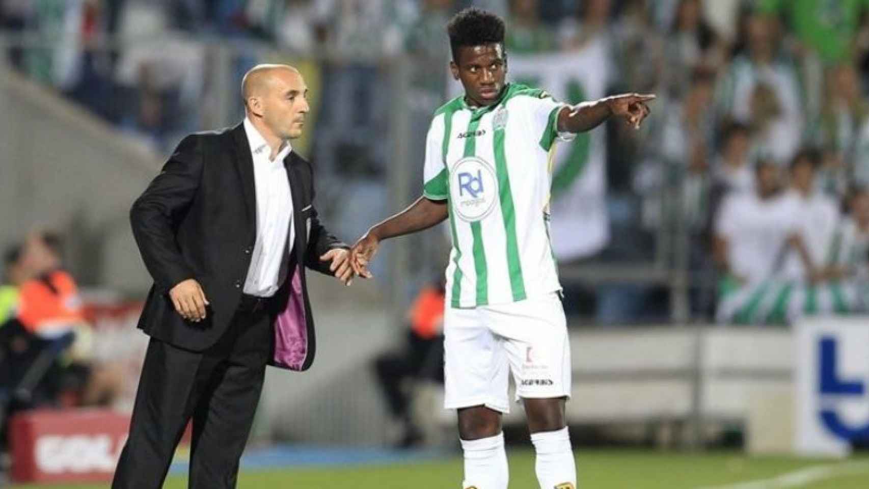 Patrick Ekeng, cuando jugaba en el Córdoba, junto a 'Chapi' Ferrer.