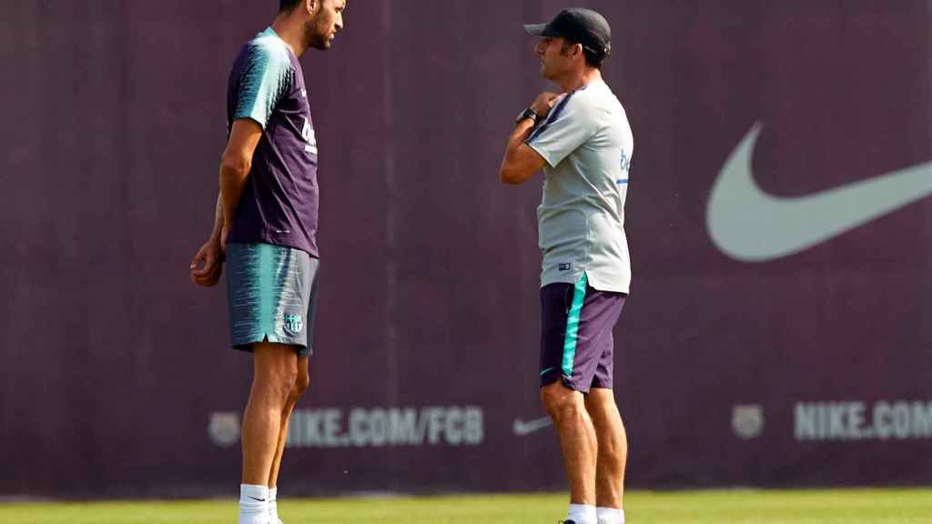 Sergio Busquets y Ernesto Valverde / EFE