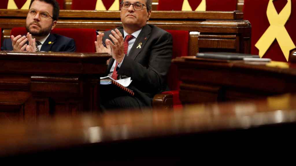 Quim Torra y Pere Aragonès, durante una sesión parlamentaria / EFE