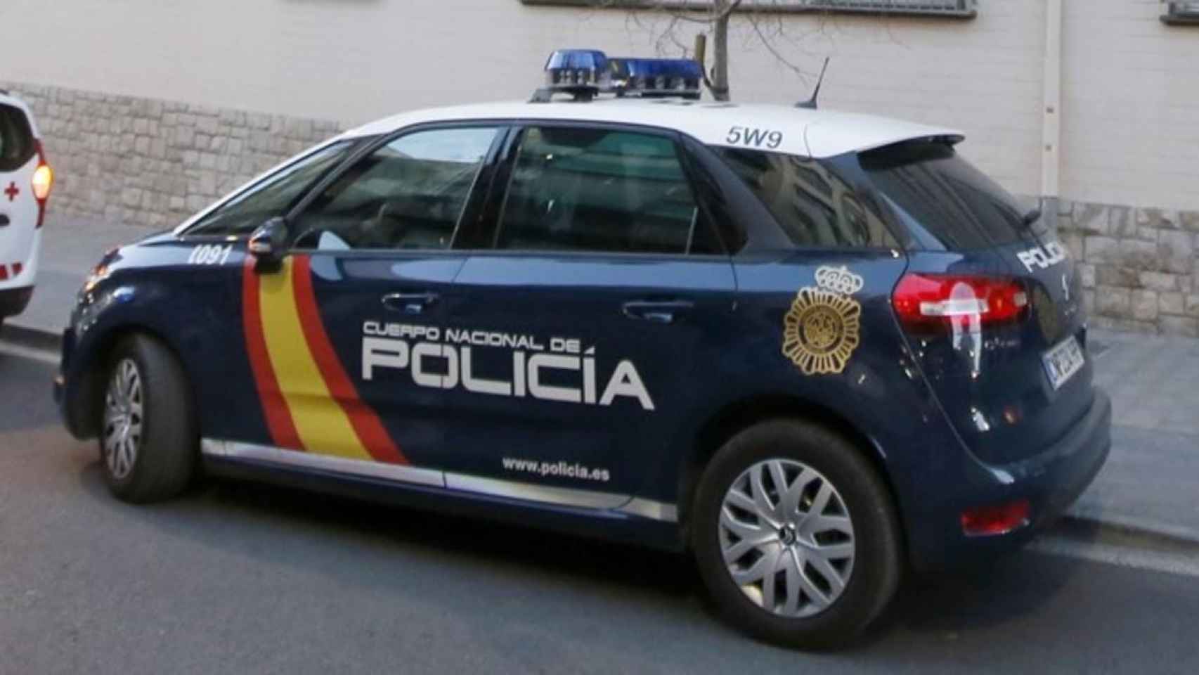 Una foto de archivo de un coche de Policía Nacional víctima agresión abuso sexual