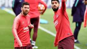 Leo Messi y Luis Suárez en el entrenamiento previo al duelo frente al Liverpool / EFE