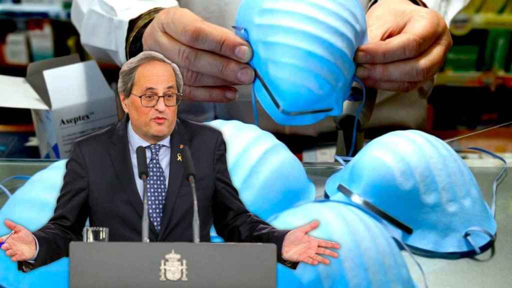 Quim Torra ante una farmacia que vende mascarillas / CG