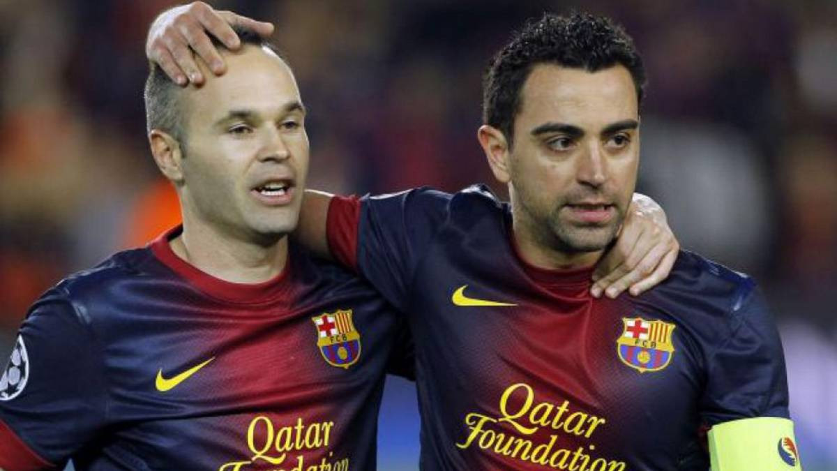 Andrés Iniesta, junto a Xavi Hernández / EFE