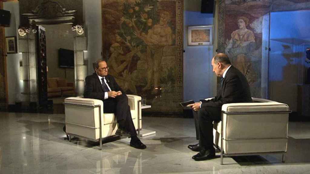 El presidente de la Generalitat, Quim Torra (i), junto al director de TV3, Vicent Sanchis (d) / CCMA