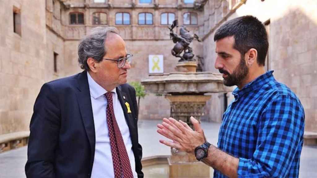 Quim Torra reunido con el fotoperiodista Jordi Borràs, presuntamente agredido por un policía / TWITTER @QUIMTORRAIPLA