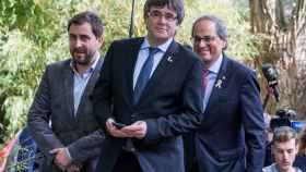 Toni Comín será el coordinador del Consejo de la República. Junto a él, en la foto, el expresidente Puigdemont y el presidente Torra / EFE