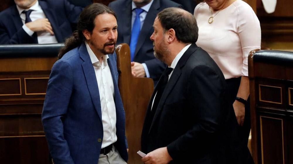 Pablo Iglesias (i) y Oriol Junqueras (d) en el Congreso de los diputados / EFE