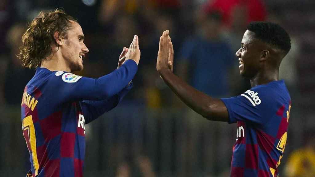 Griezmann, junto a Ansu Fati en una imagen de archivo / EFE