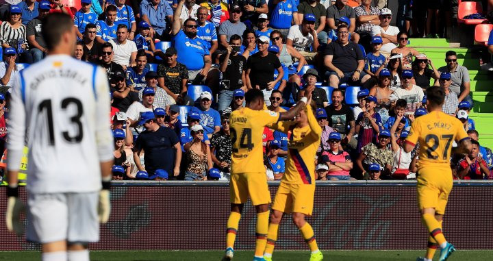 Firpo y Griezmann celebrando el segundo gol del equipo en Getafe / EFE