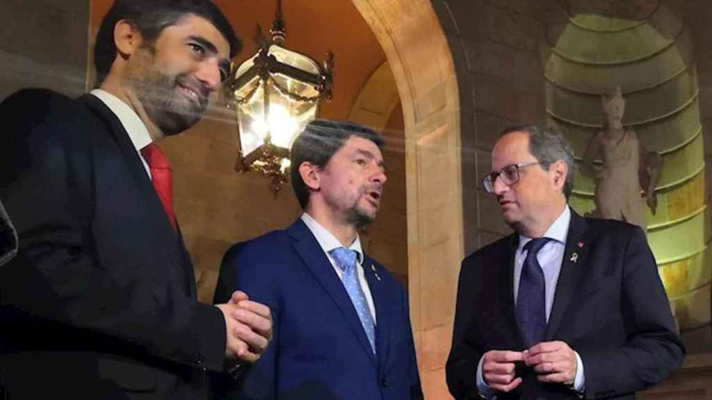 El consejero Jordi Puigneró y el presidente de la Cámara de Comercio, Joan Canadell, ambos favoritos de Carles Puigdemont, junto a Quim Torra /EUROPA PRESS