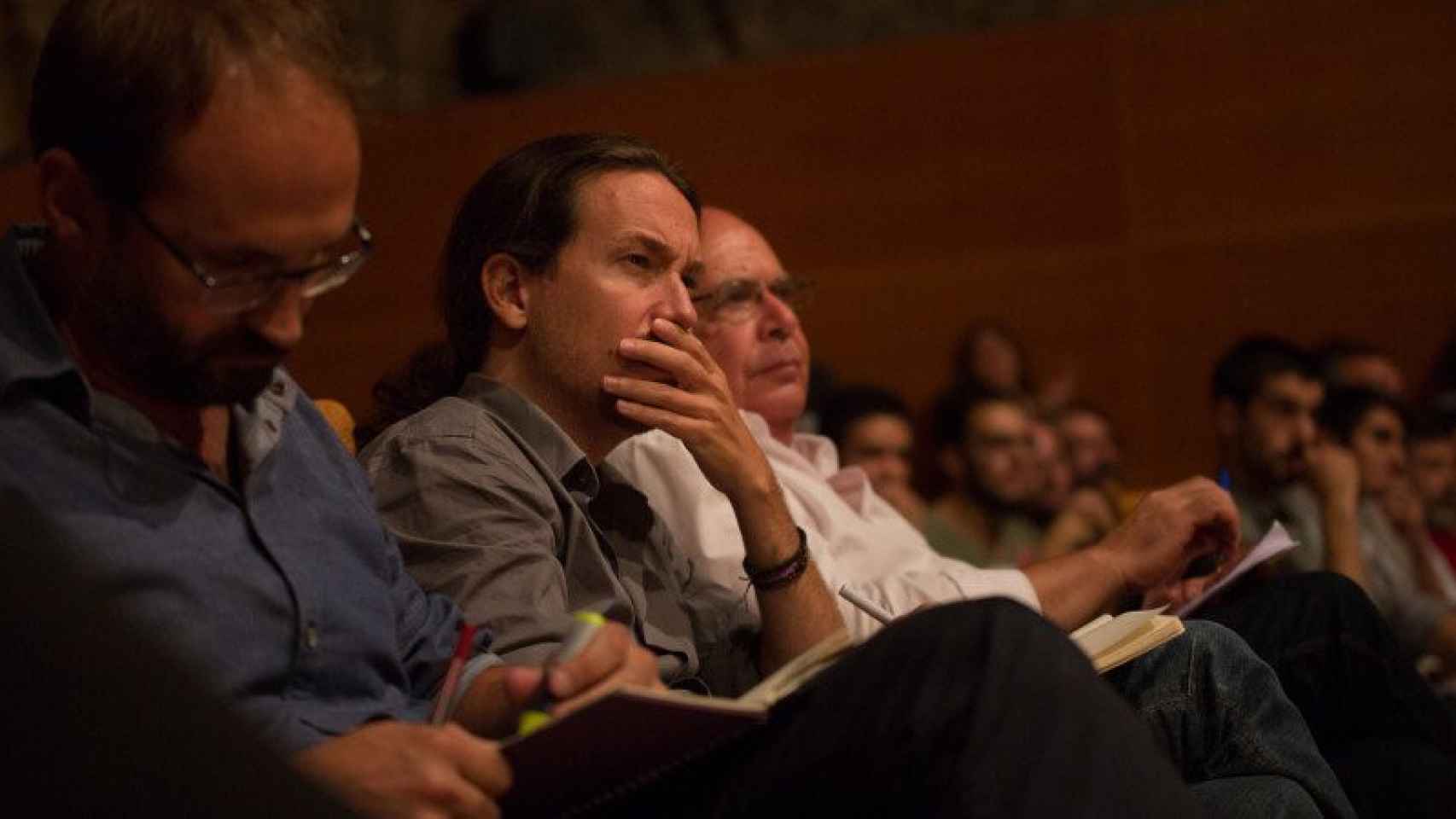 El colíder de ICV Joan Herrera, el secretario general de Podemos, Pablo Iglesias, y el candidato de Catalunya sí que es pot, Lluís Rabell, en un acto electoral.