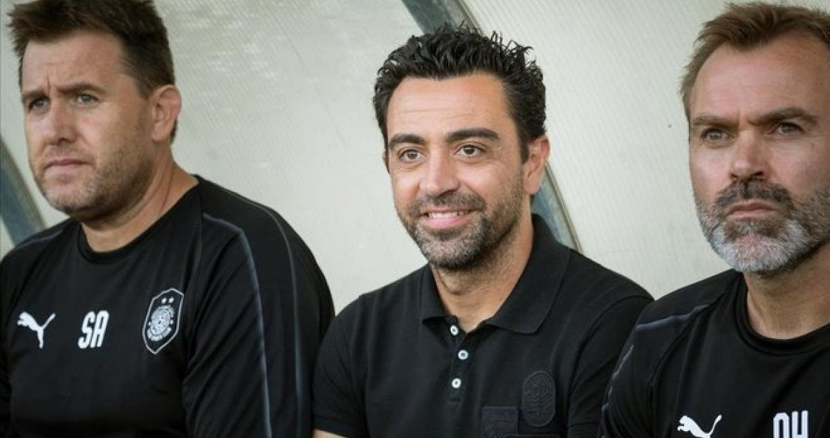 Sergio Alegre, Xavi Hernández y Óscar Hernández, en un partido del Al Sadd / EFE