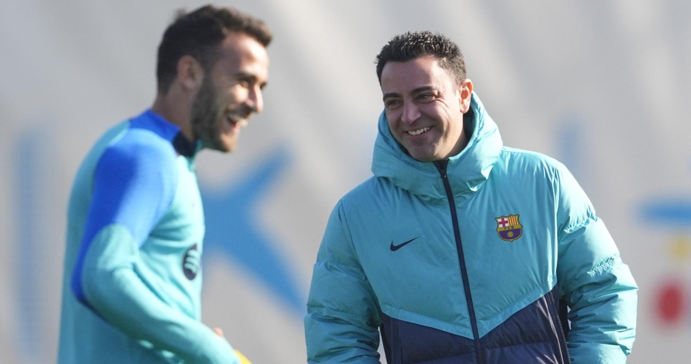 Xavi y Eric García, en el entrenamiento del día antes de jugar contra el Girona / EFE