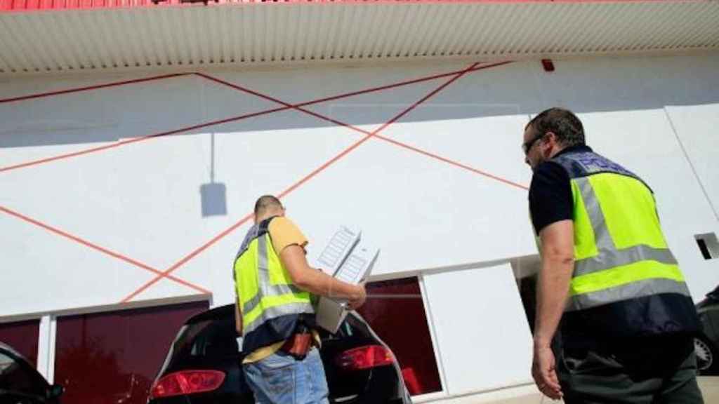 Registro de la Policía Nacional en una de las sedes de iDental / EFE