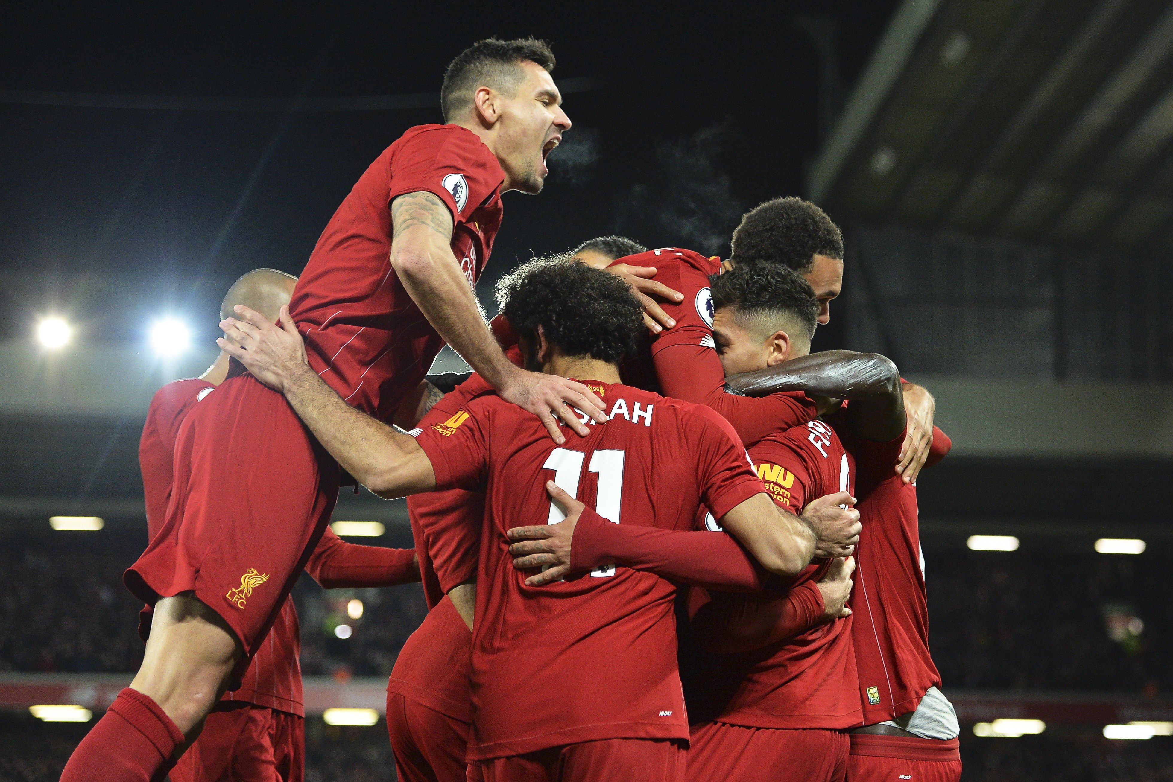 Los jugadores del Liverpool celebrando un tanto contra el Manchester City / EFE